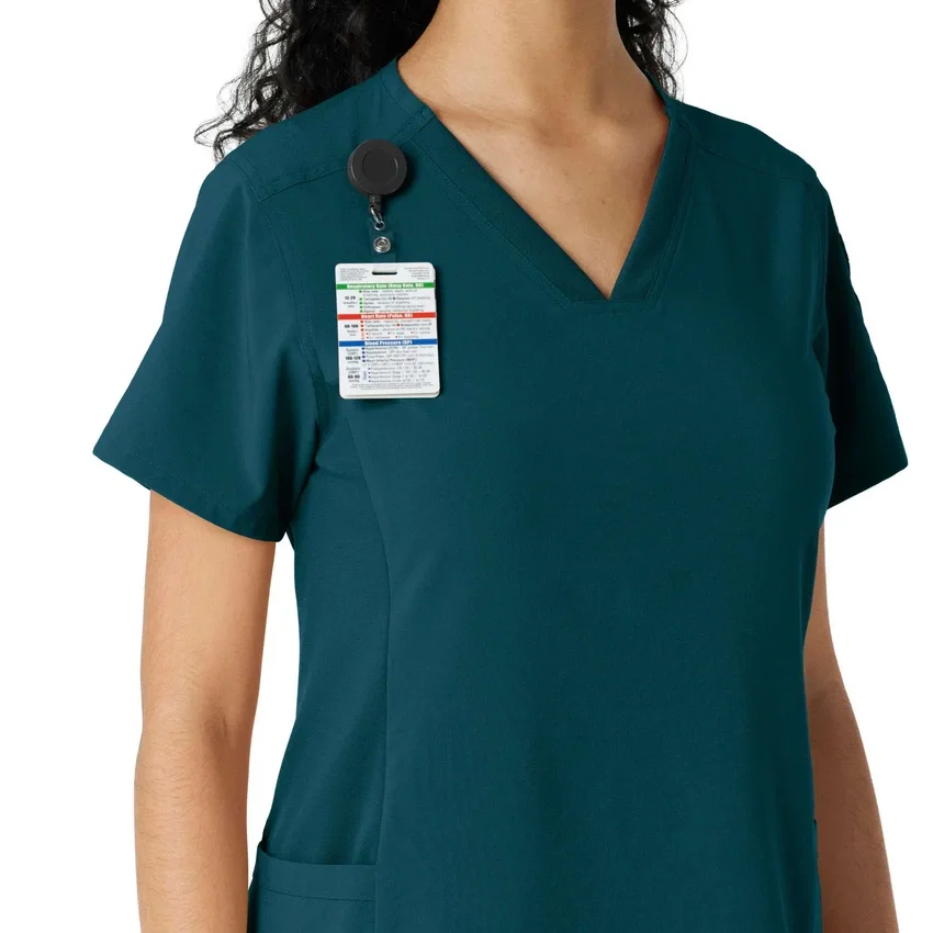 Blusa médica Force Cross-Flex con paneles de punto para mujer