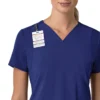 Blusa médica para mujer Force Cross-Flex con cuello en V y paneles elásticos en la parte de arriba