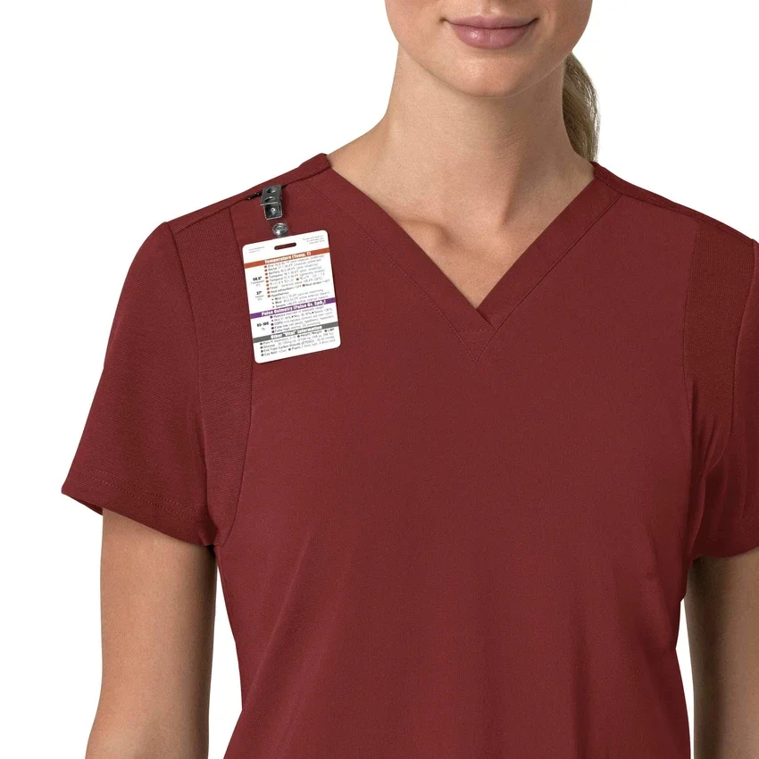 Blusa médica para mujer Force Cross-Flex con cuello en V y paneles elásticos en la parte de arriba