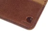 Cartera con bolsillo delantero de piel patinada