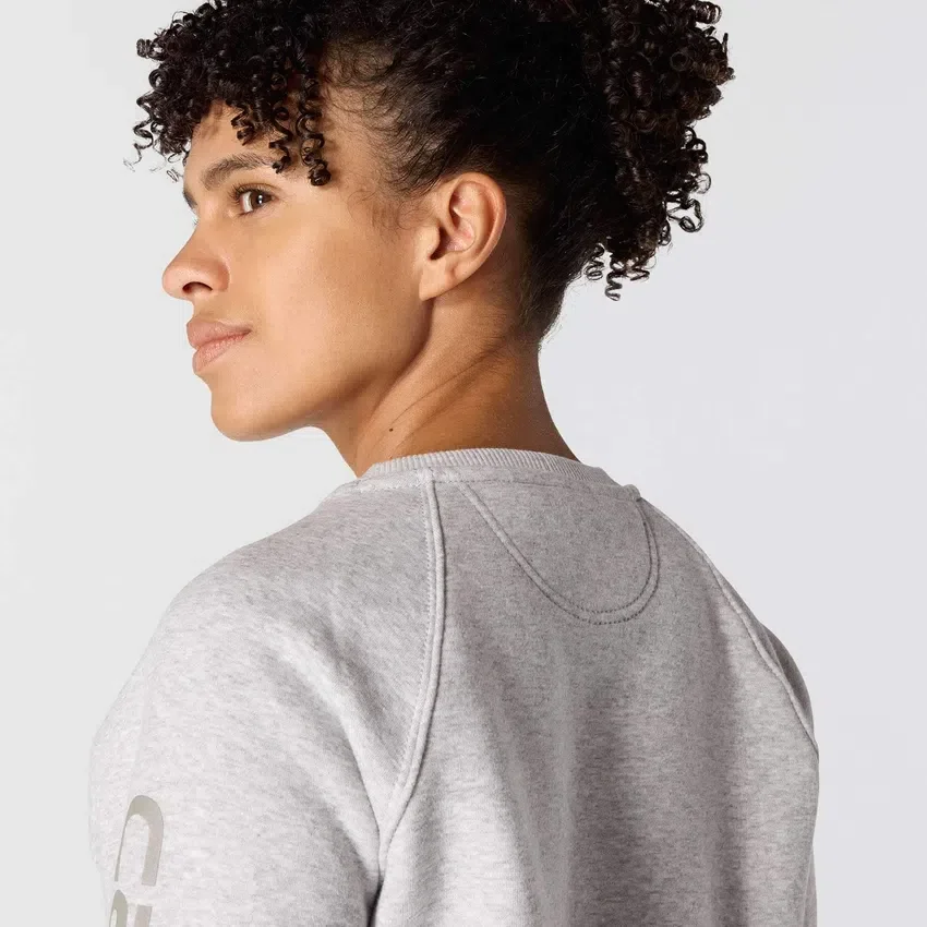 Sudadera de cuello redondo con estampado gráfico, corte holgado y peso medio para mujer